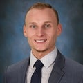 Aron Hodo Real Estate Agent at Real Estate One Rosemary Davis